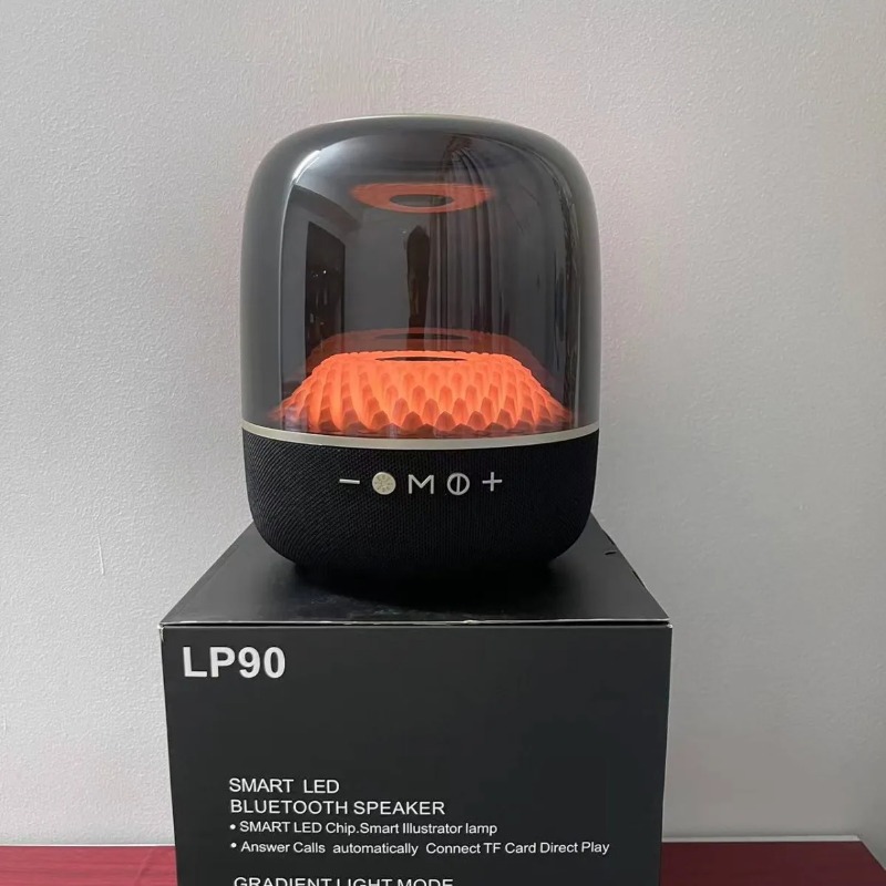 LP90 pro portable wireless speaker with a transparent dome and RGB lighting.